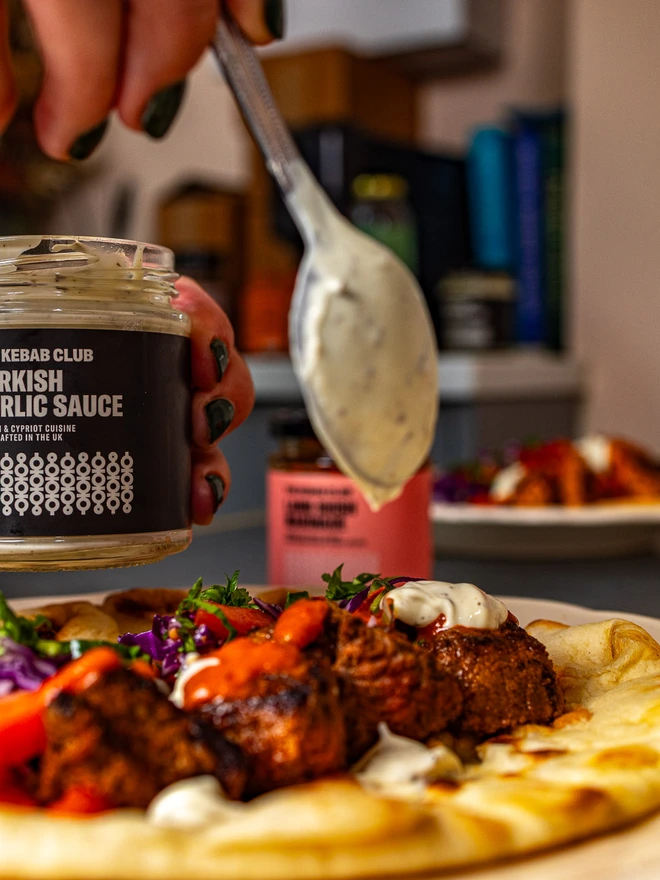 drizzle jar of turkish garlic sauce