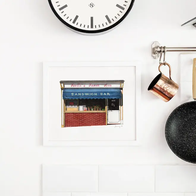 Clerkenwell Scotti's Snack Bar Giclée Print (Unframed), a print of a snack bar sitting on a white backdrop. It is joined by a clock. 