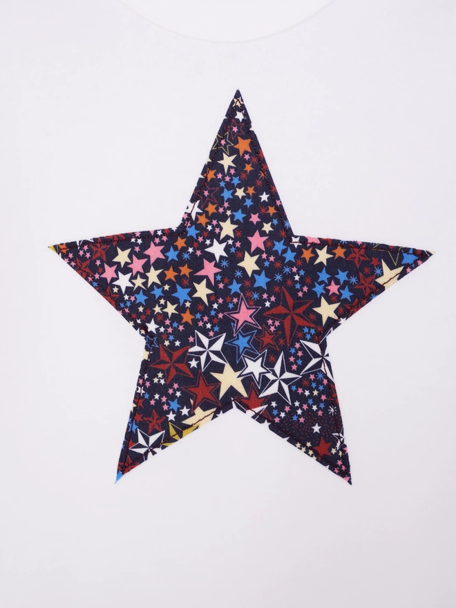 a liberty starry print star white bodysuit