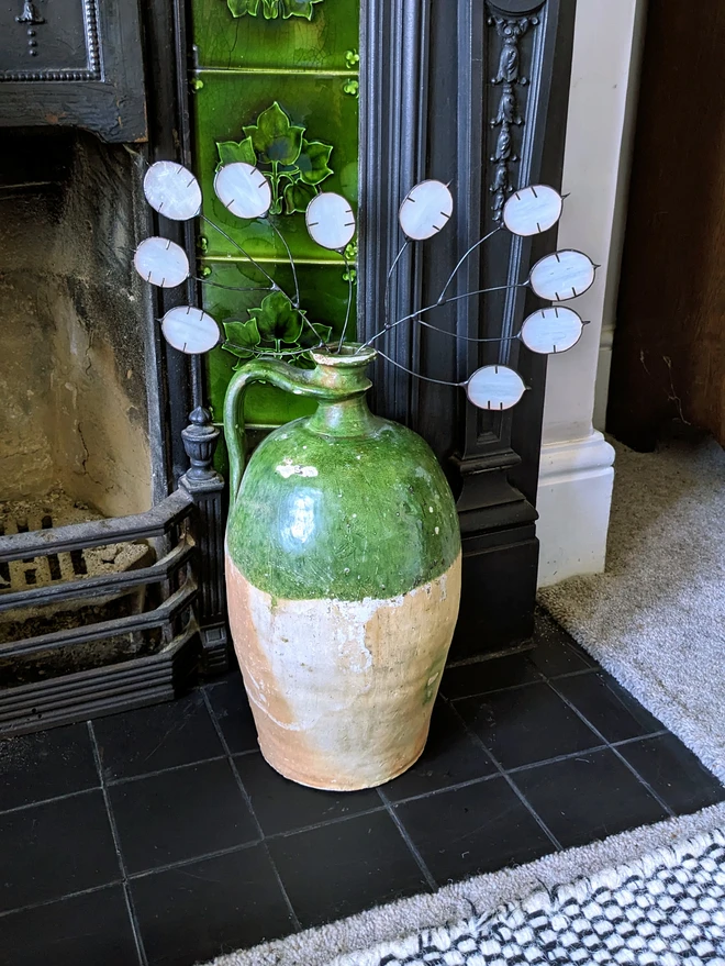 Honesty branches in jar 