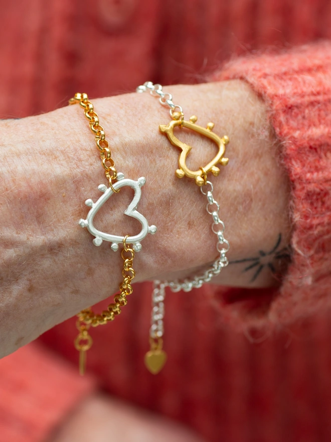 Bold yet beautifully simple, the Studded Heart Bracelet pairs a chunky belcher chain with a delicate mini studded heart charm. Personalise the tiny heart on the extender with your initial to create a contemporary heart bracelet made for stacking, gifting or wearing solo as your signature piece.