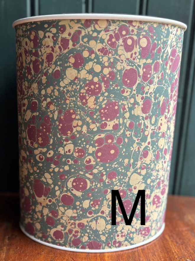 Oval Waste Paper Bin. A bin in M
