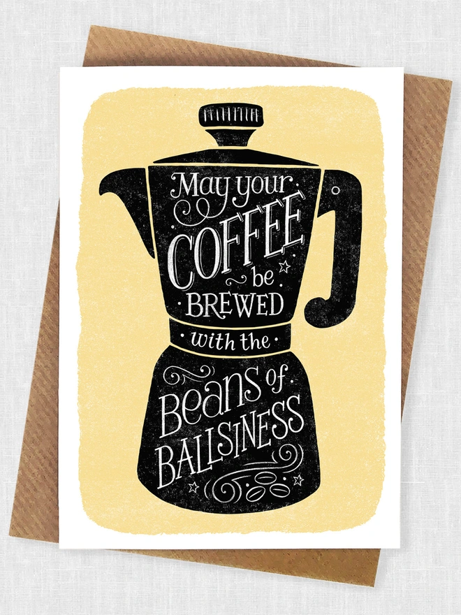 black coffee cup on yellow background with white hand lettered coffee quote inside