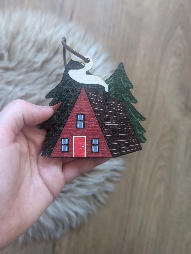 red cabin wooden Christmas decoration