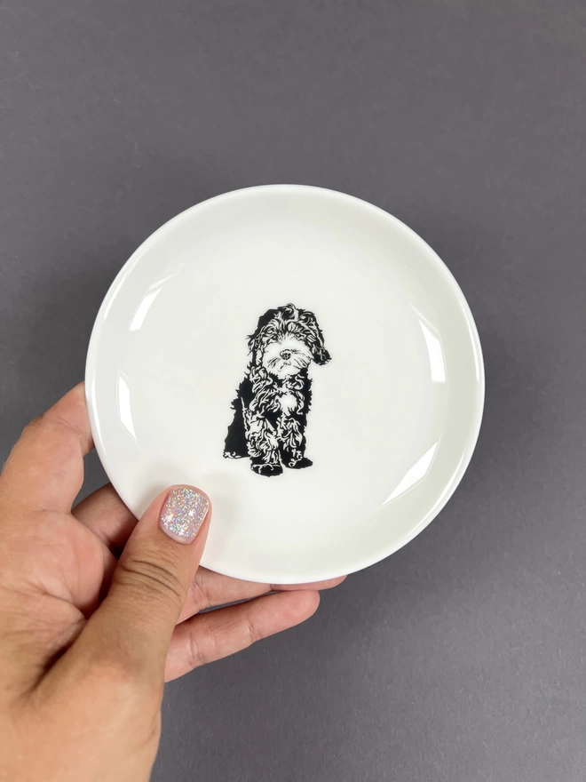 The round Cockapoo puppy trinket tray perfect for holding rings and other things