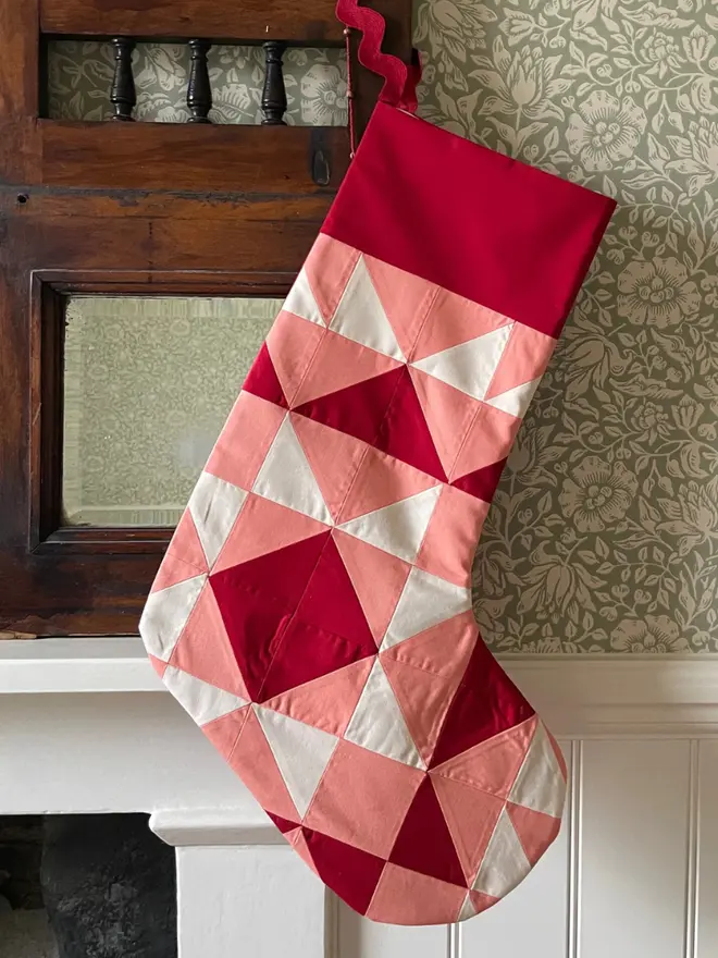 Cinnamon Patchwork Stocking, hanging. 