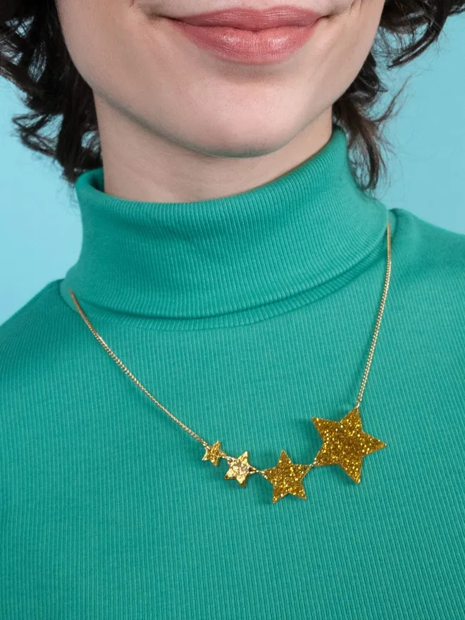 Shooting Star necklace in glitter gold