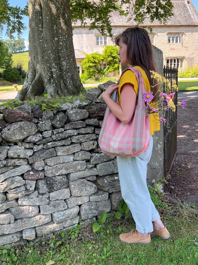 model with handmade tote bag