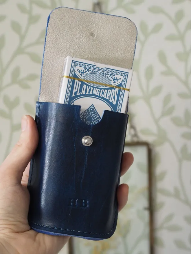 leather playing card holder in dark blue