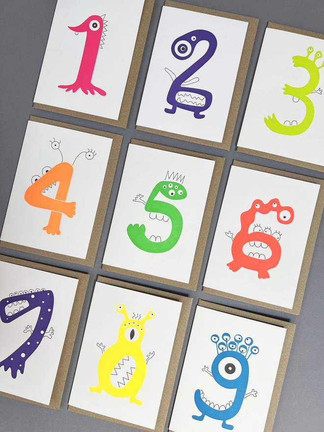 Alien numeral one to nine neon cards for children's birthdays with envelopes