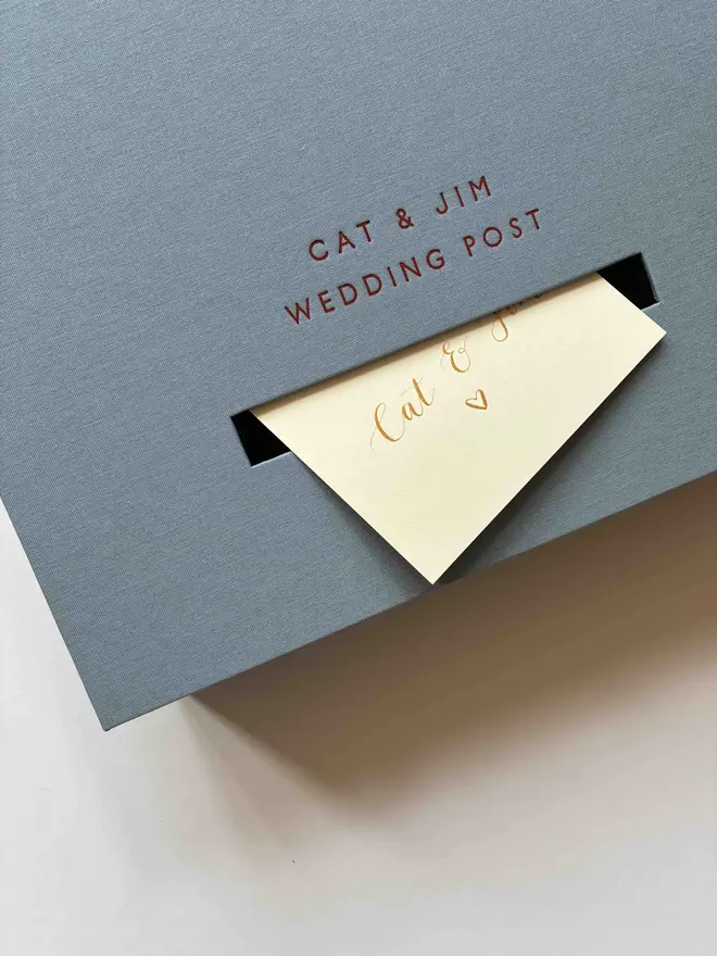 Handmade wedding postbox by Keep Collect in Powder Blue book cloth with dark red foiled personalisation