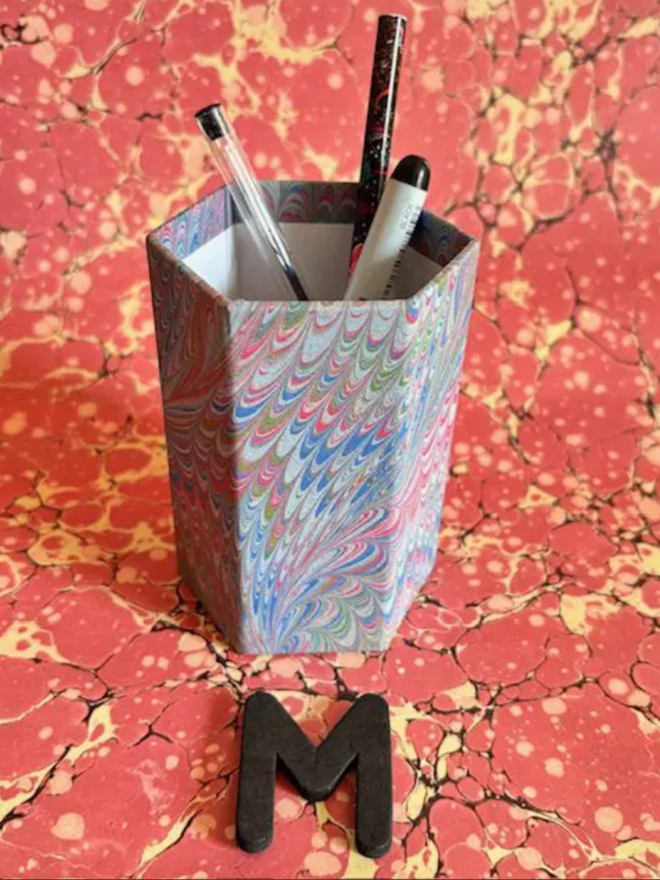 Pen Pot. A pen pot in M