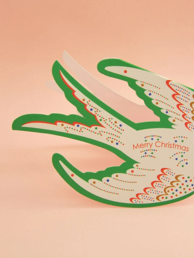 Die cut bird Merry Christmas card.