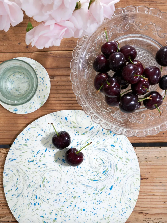 Round Table Mats. A cream table mat.
