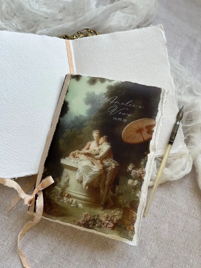 Inside pages of rococo handmade paper vow booklets