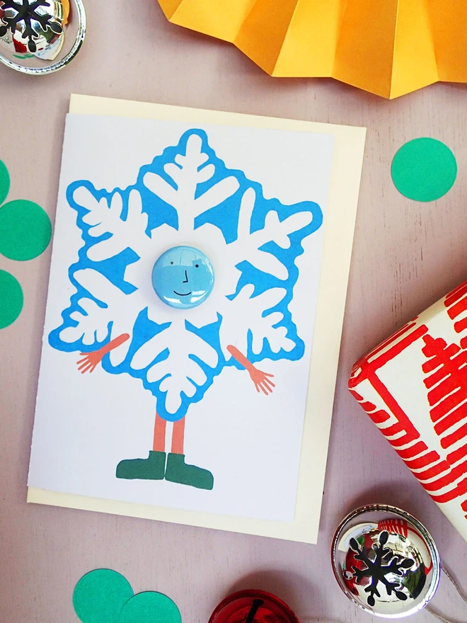 snowflake costume christmas greeting card with pin badge