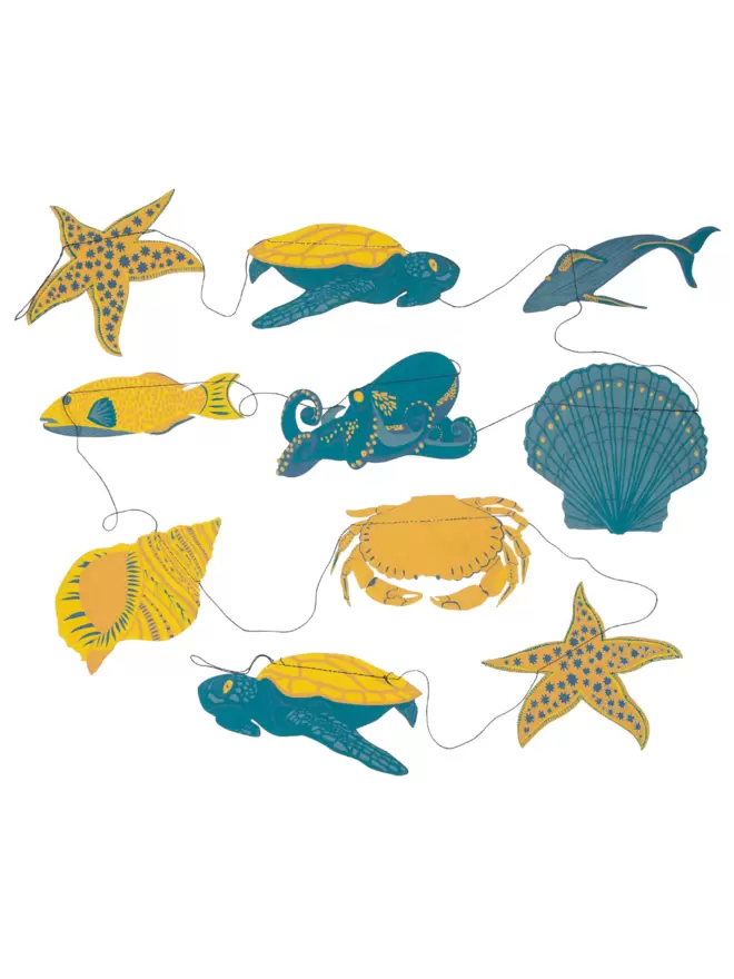 All 10 under the sea creatures and seashells in blue and yellow laid out