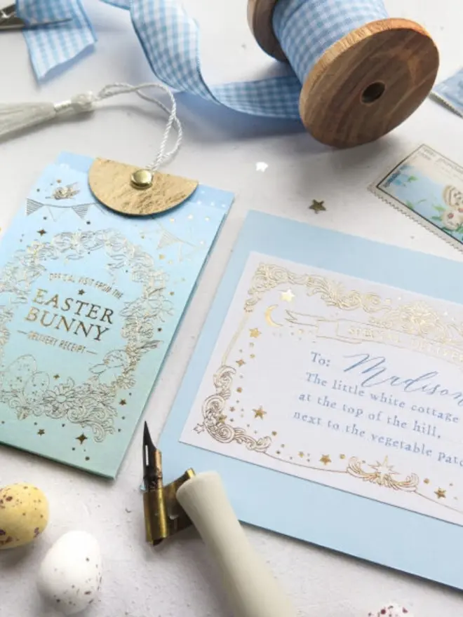 The receipt pouch next to a blue envelope with a "Special Delivery" label for Madison, "next to the vegetable patch." A gingham ribbon spool and mini eggs sit nearby.