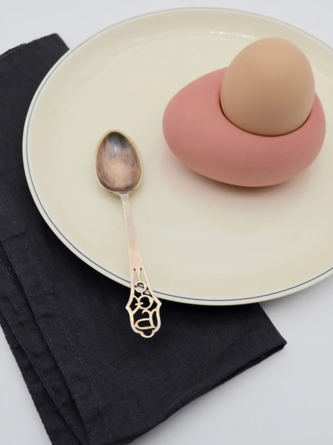 Kelly Egg Cup. A pink egg cup.