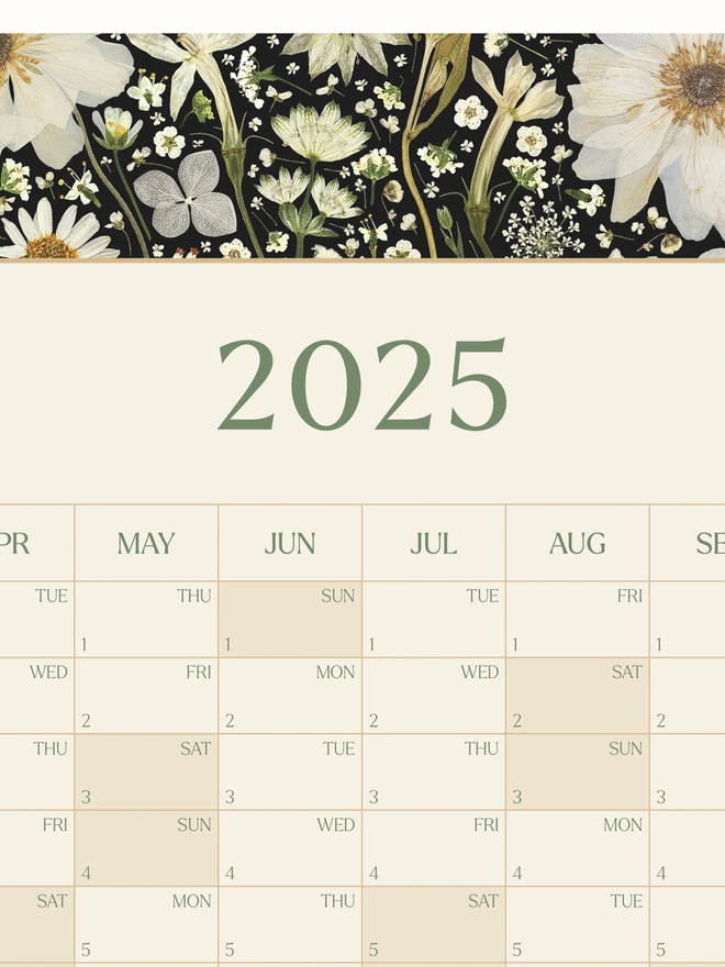 A pretty floral year wall planner. A 2025 calendar with a delightful pressed flower design created from pressed white flowers. Perfect for bringing a touch of the outdoors to any studio, home office or workspace. 