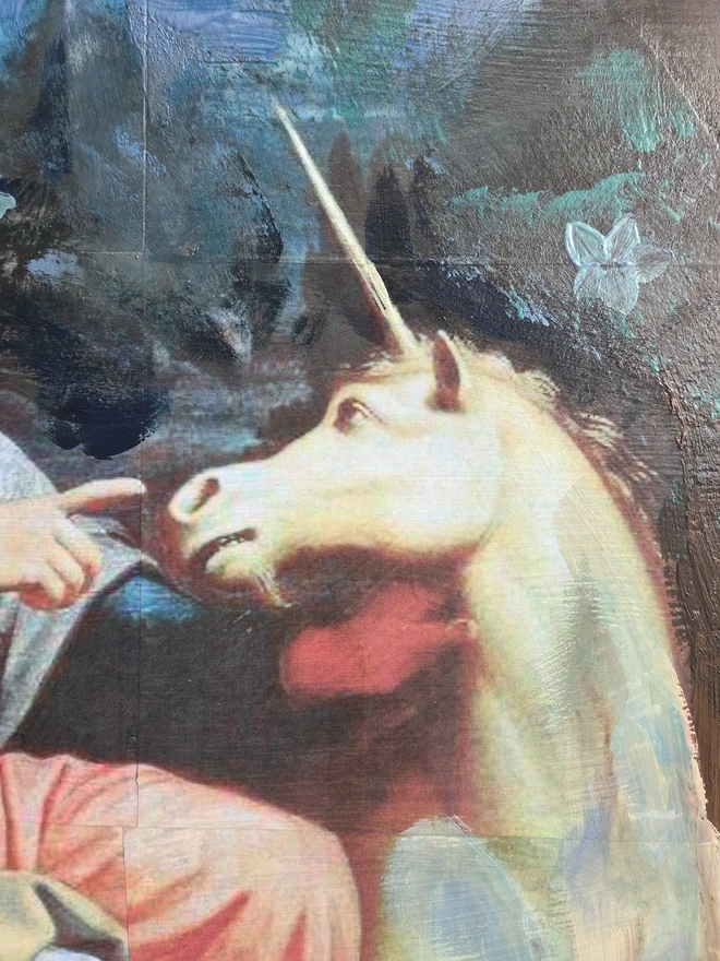 Unicorn art panel made from an upcycled table-top.