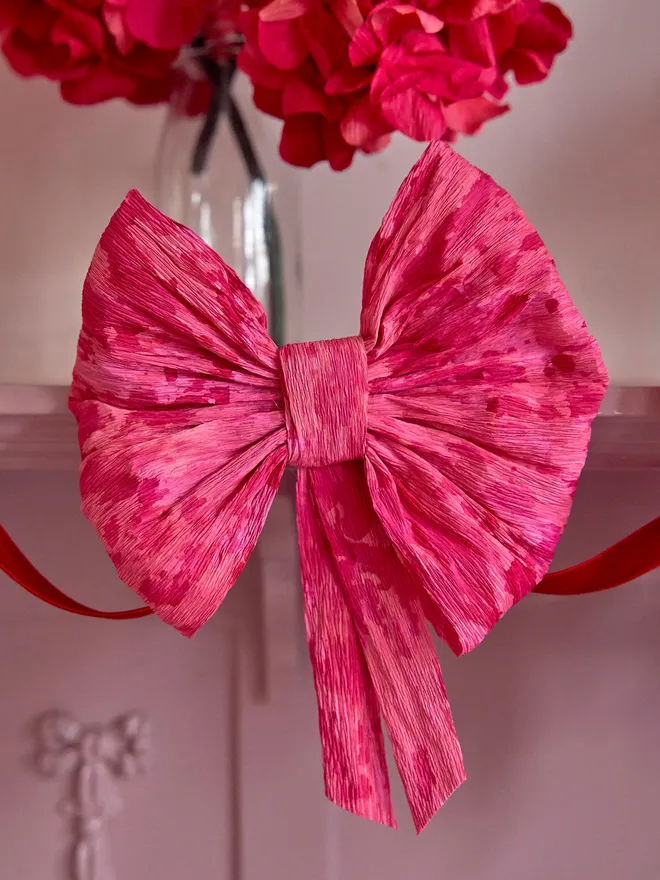 Pink bow crepe paper bunting