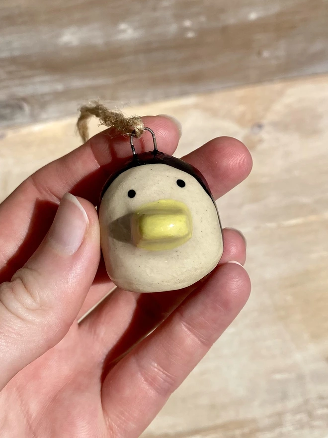 ceramic penguin hanging decoration front