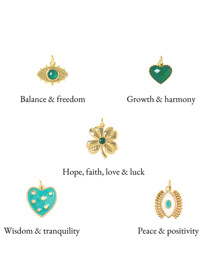 Green, turquoise and gold charms on a white background