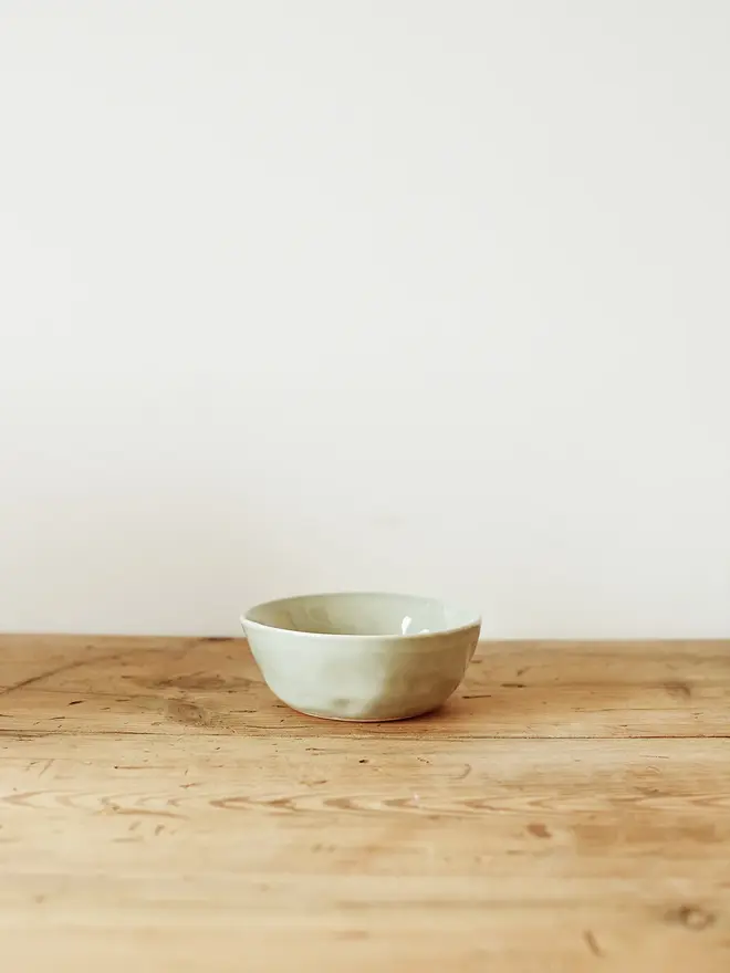 'seaglass' handcrafted stoneware bowls. a small green stoneware serving bowl.