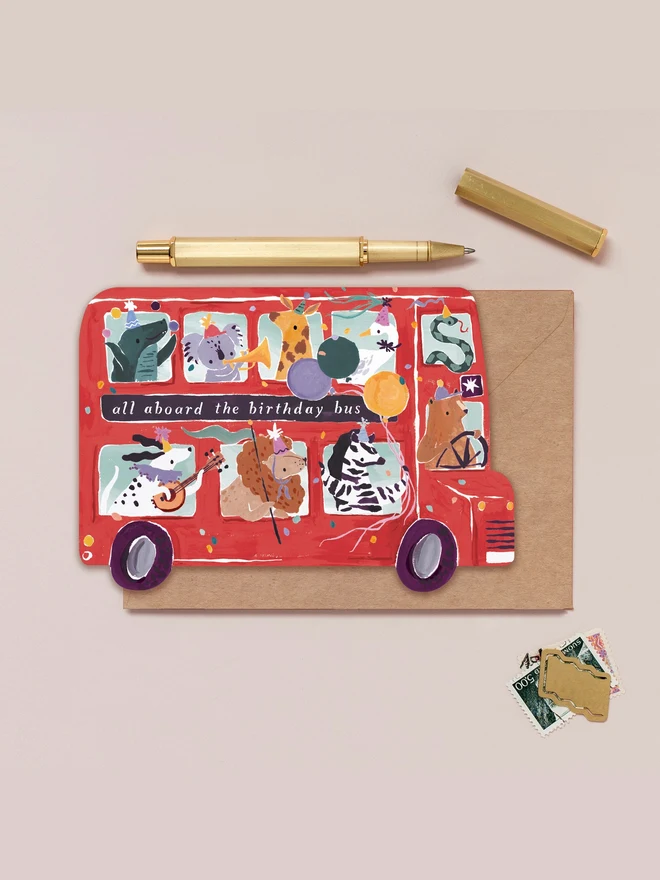 Party Bus Kids Birthday Card by Sister Paper Co with a kraft envelope