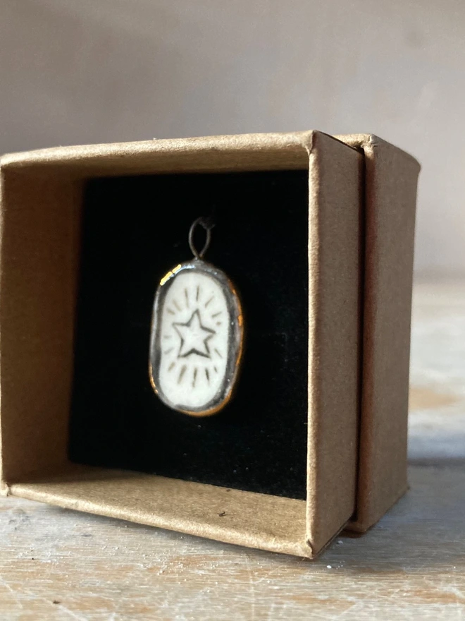 star pendant boxed