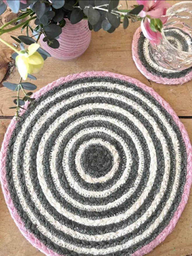 lifestyle shot of fig placemats and matching coasters