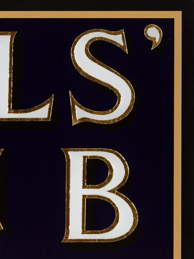 girls club hand painted sign. sign zoomed in on letter details.