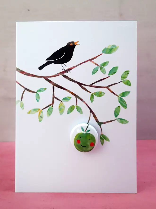 Apple and blackbird greeting card with pin badge