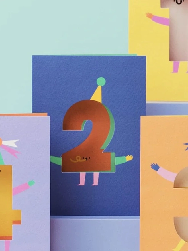 2nd Birthday Card, against a blue background, surrounded by other birthday cards. 