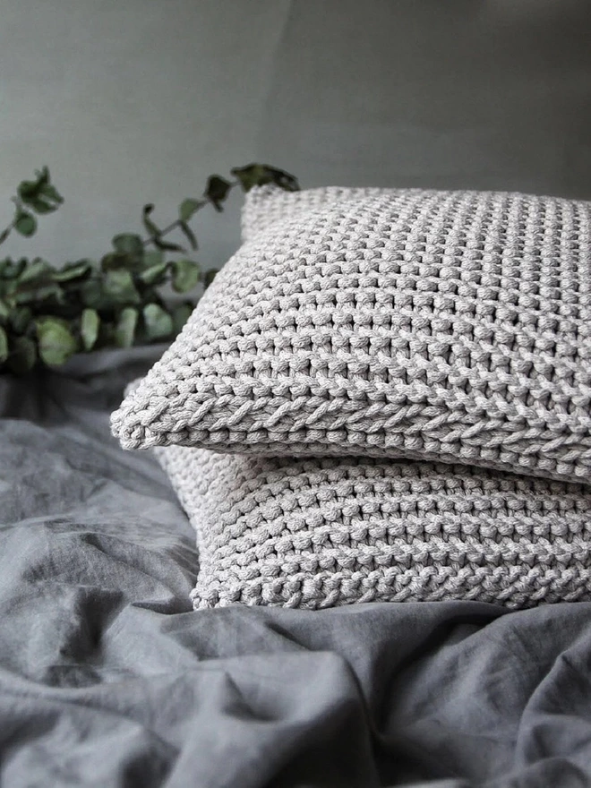 hand knitted grey cushions 1