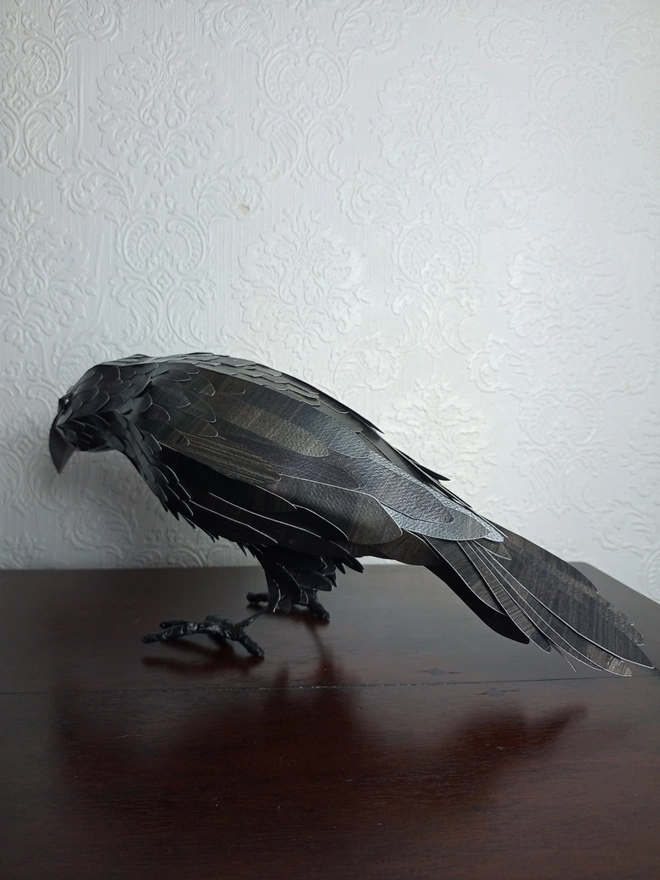 back view of a handmade crow sculpture