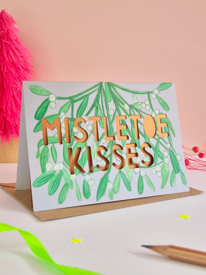 Mistletoe illustration christmas card with shimmering rose gold pearlescent liner 