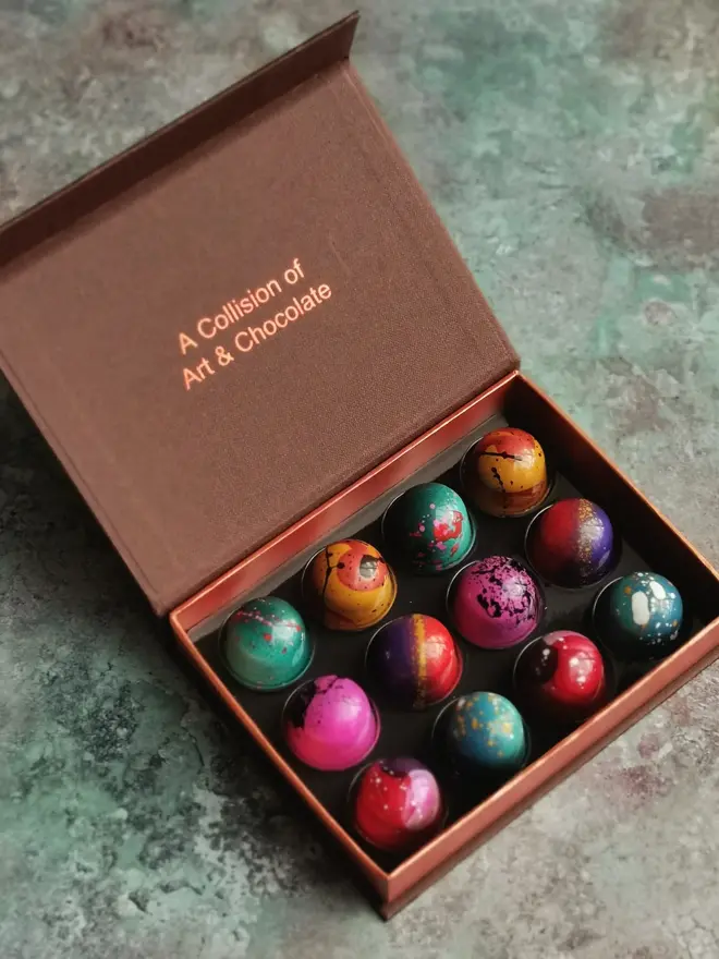 box of 12 colourful chocolate bonbons