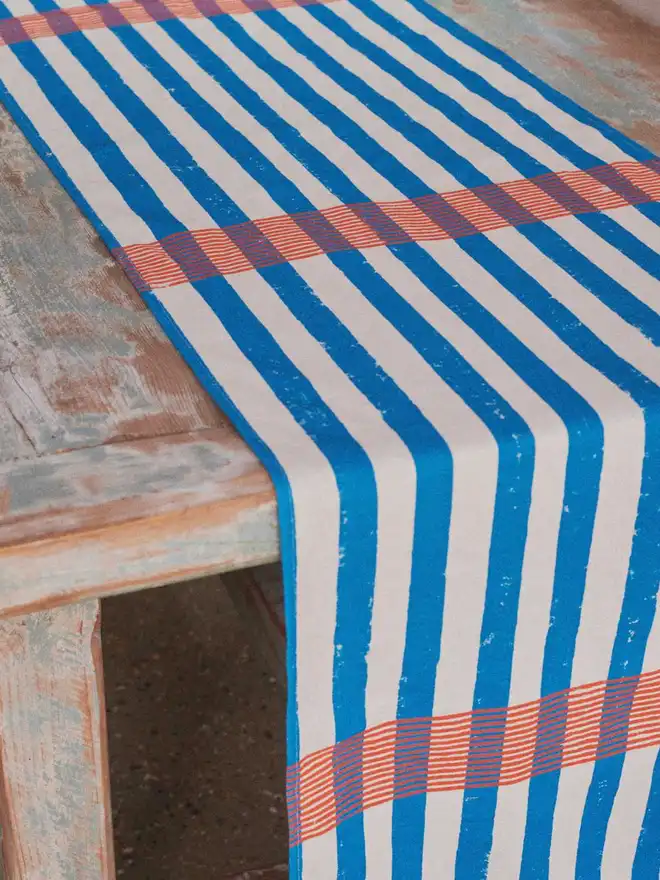 Blue and orange stripe table runner