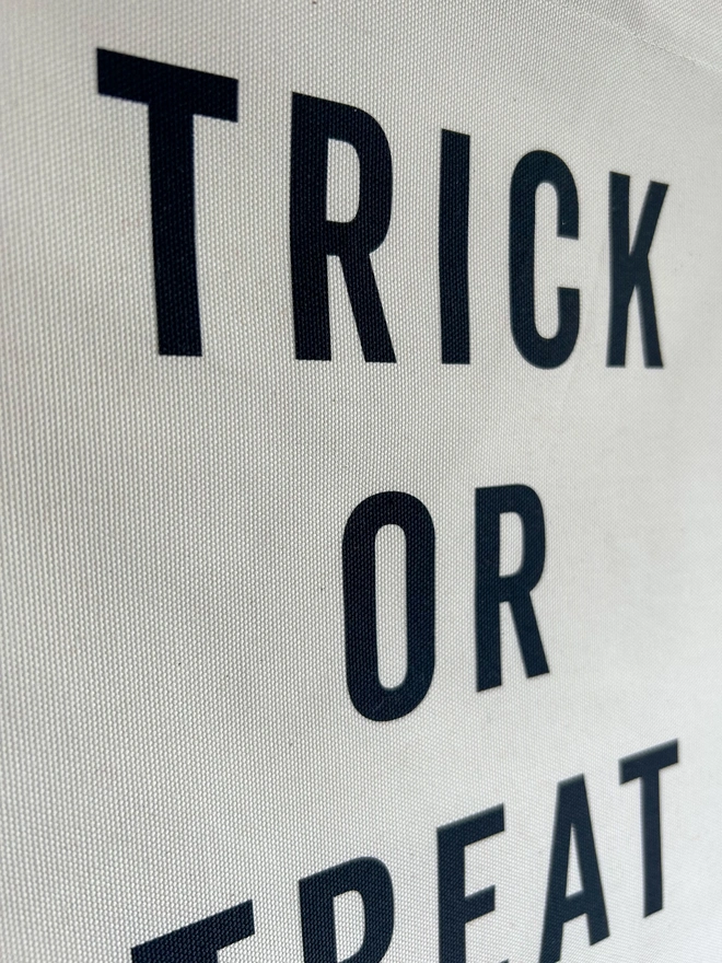 Trick or Treat Printed in black on thick cotton banner 