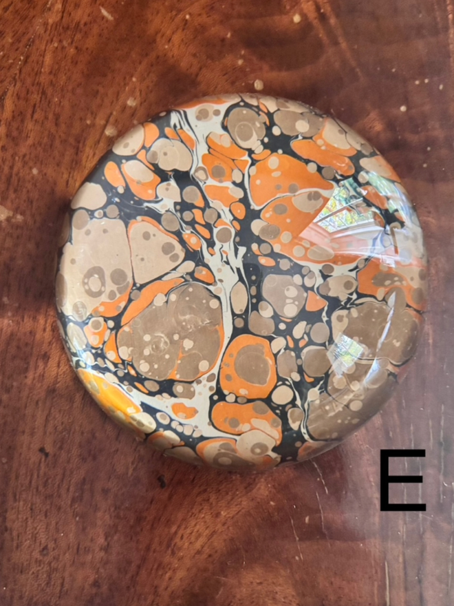 Large Paperweight. A paperweight in E.