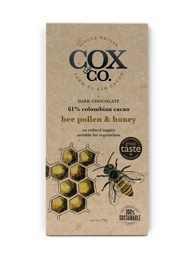 Bee Pollen & Honey Chocolate Bar (Set Of 1, 2 Or 3), a chocolate bar sitting on a white surface. 