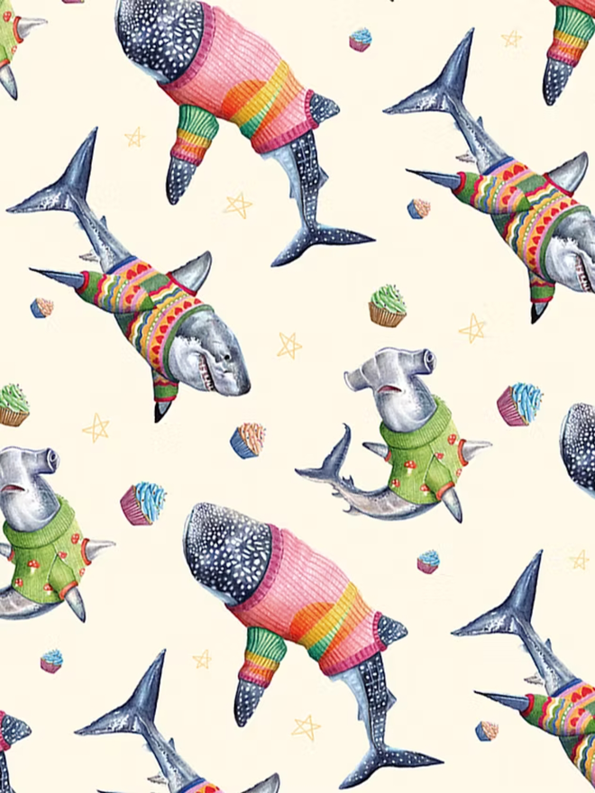 illustrated sharks in jumpers wrapping paper sheet. a sheet of cream wrapping paper featuring illustrated sharks in wooly jumpers.