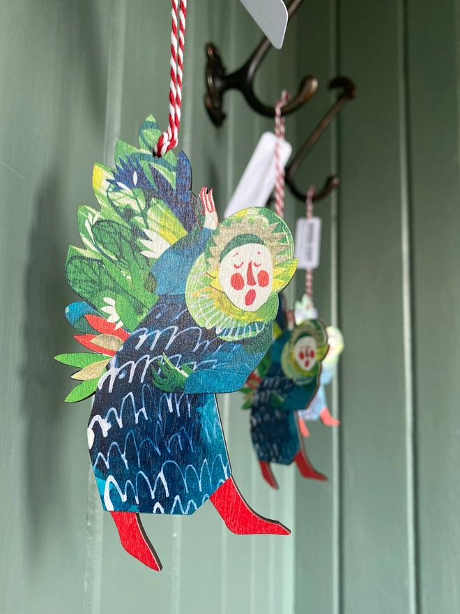 Esther Kent Snging Angel blue, red and green hanging angel decoration laser cut from wood