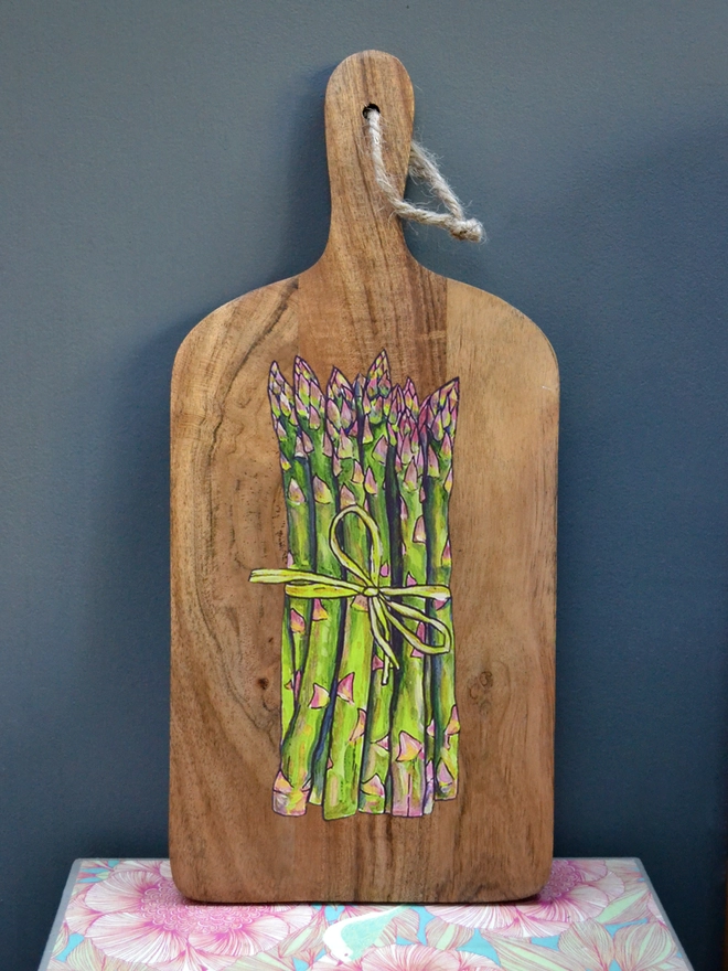 Asparagus design handpainted on wooden serving board