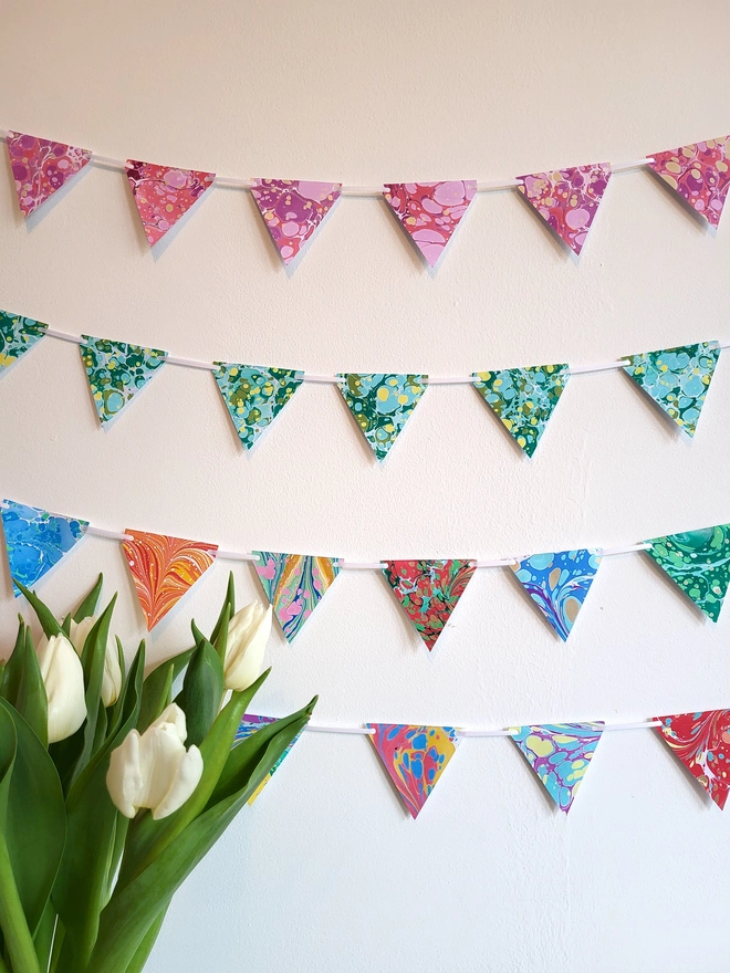 Hand-marbled multi-coloured rainbow paper bunting