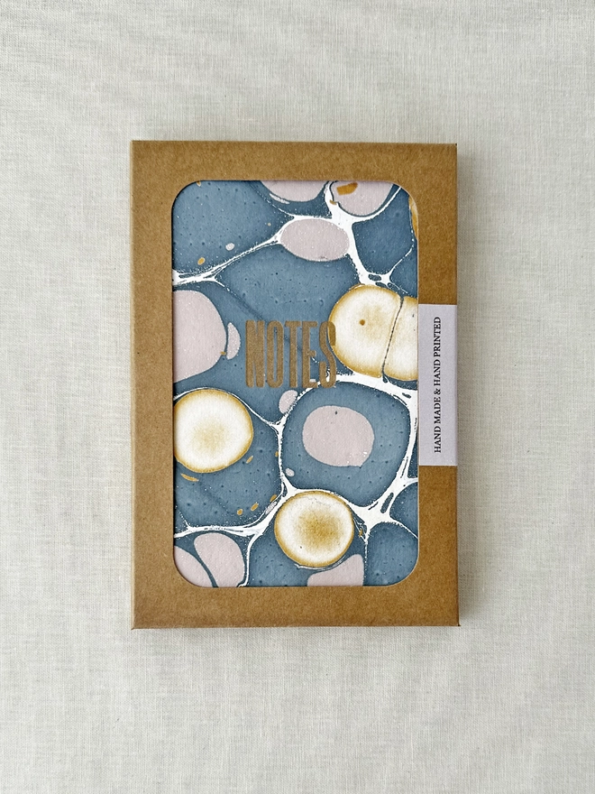 blue & pink marble book in pack