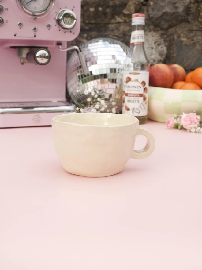 handmade stoneware pottery mug with handpainted croissant