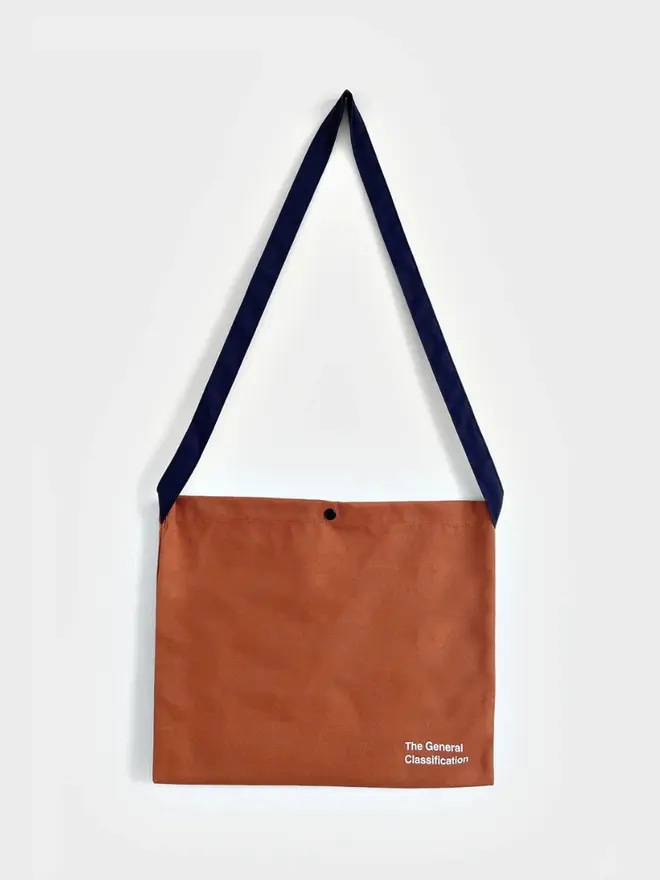 'Beer Bag' Musette Bag, against a grey background. 